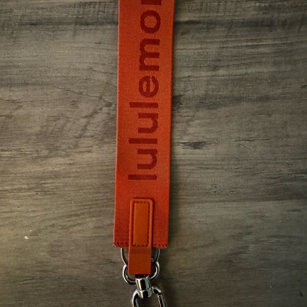 Lululemon Athletica Orange Never Lost Keychain